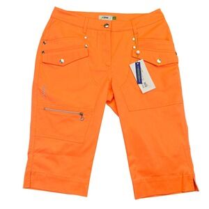 XDS By Daily Sports NWT Capri Pants Women's‎ Size 8 Orange Scramble Pro Stretch